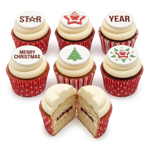 Christmas cupcakes with white icing, red cases, and festive star and Christmas tree toppers.