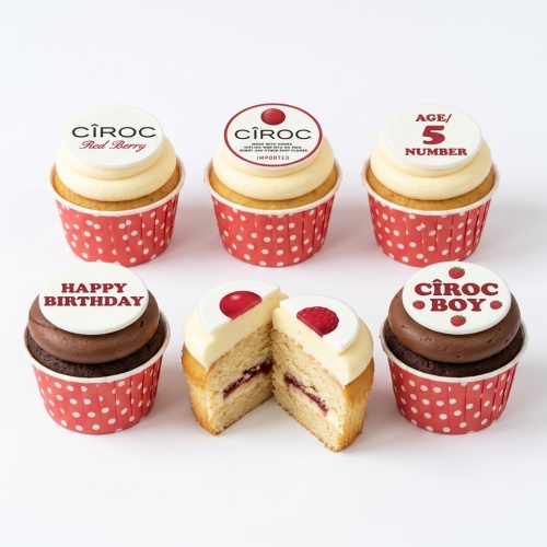 Cîroc themed cupcakes with red and white branding, some with "Happy Birthday" and custom age toppers.