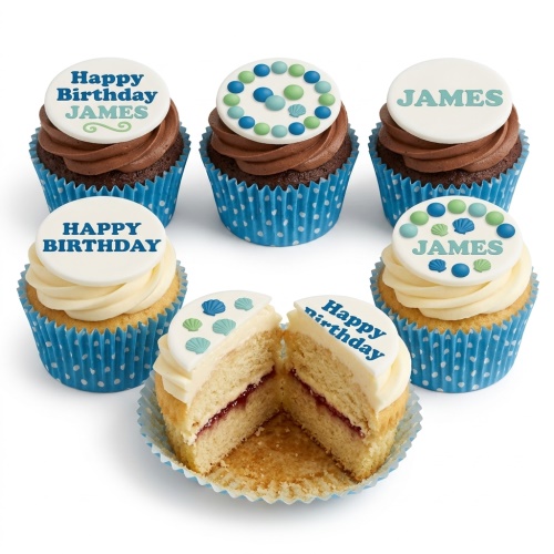 Chocolate and vanilla cupcakes with blue and green seashell and dot decorations, featuring personalised 'Happy Birthday' and name toppers.