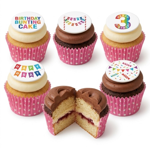 A selection of colourful birthday cupcakes with bunting and 'Happy Birthday' toppers, in pink polka dot cases.