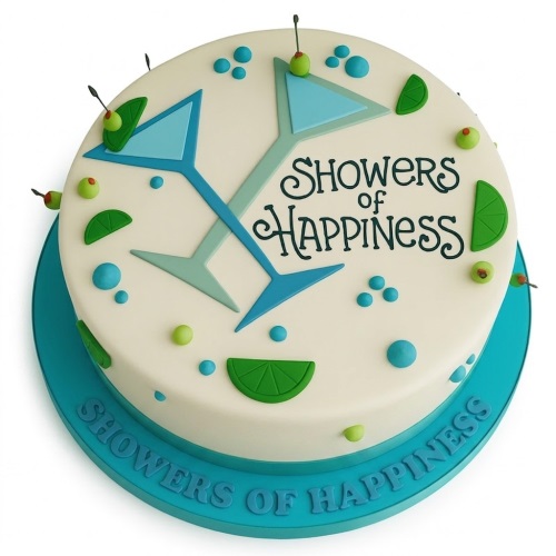Round white cake with blue martini glasses, green lime slices, olives, and 'Showers of Happiness' text.