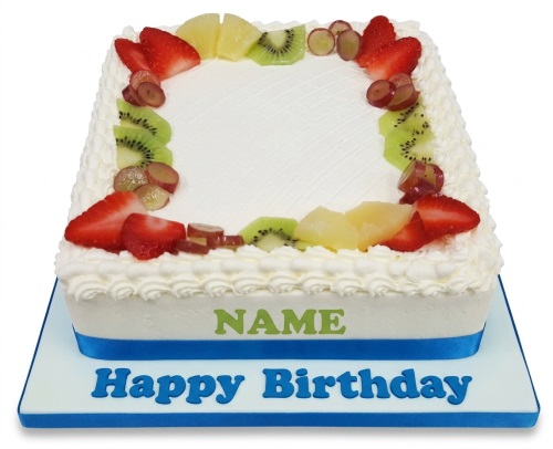 Rectangular fresh fruit birthday cake with strawberries, kiwi, grapes, pineapple, and white cream.