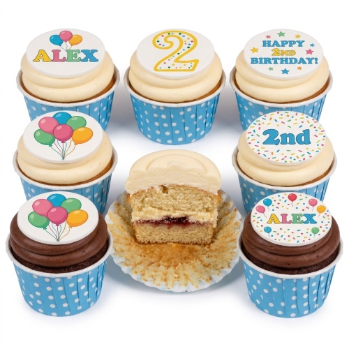 A set of 2nd Birthday cupcakes with cream and chocolate frosting, decorated with colourful balloon, number two, and personalised name toppers in blue polka dot cases.