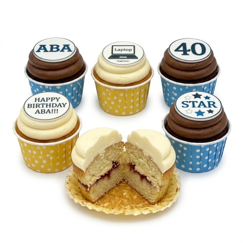 Six cupcakes with chocolate and vanilla frosting, blue and yellow polka dot cases, and custom edible toppers.