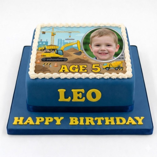 Square blue birthday cake with an edible image of a construction site, diggers, and a child's photo, with custom name and message.