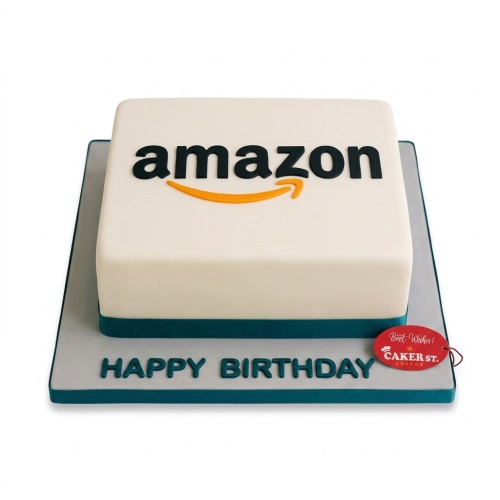 Square white cake with black Amazon logo and orange smile, with 'HAPPY BIRTHDAY' on the cake board.
