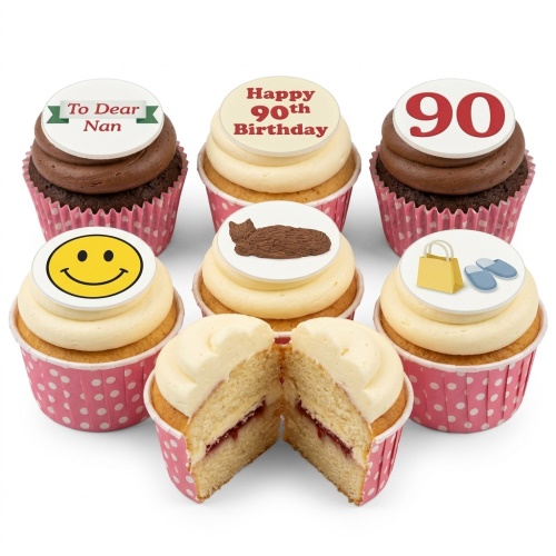 Assortment of birthday cupcakes with white and chocolate frosting, topped with custom age, cat, smiley, shopping bag, and slippers.