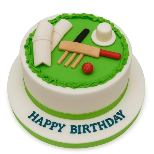 Round white and green birthday cake with edible cricket bat, ball, stumps, and pads.