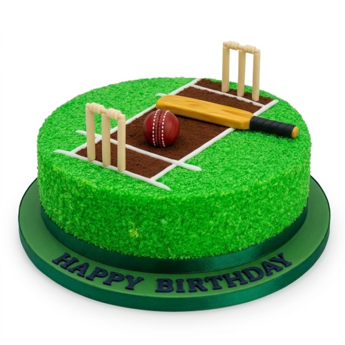 Round green cricket pitch birthday cake with edible bat, ball, and wickets.