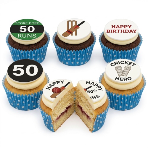 Cricket themed birthday cupcakes with bat, stumps, and score board toppers, in blue polka dot cases.