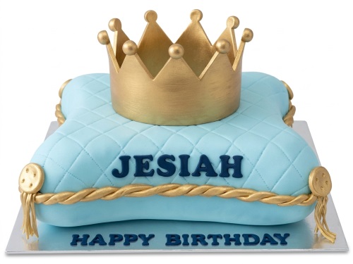 Blue quilted pillow cake with golden crown and "Happy Birthday" message