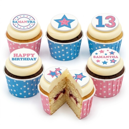Vanilla and chocolate cupcakes with white frosting, topped with pink and blue star edible discs and 'Happy Birthday' message.