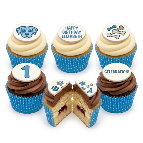 Six puppy dog themed birthday cupcakes with blue polka dot cases, dog face, bones, paw prints, and party hat toppers.