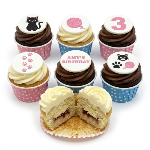 A set of cat-themed birthday cupcakes with custom age and personalised message toppers.