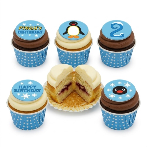 Pingu themed cupcakes with blue and white polka dot cases, featuring Pingu, snowflake, and custom age toppers.