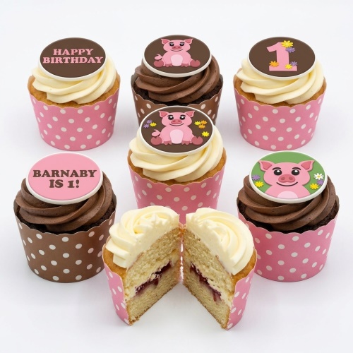 Assortment of pig theme birthday cupcakes with vanilla and chocolate frosting, custom age topper, and personalised message.