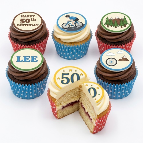 A set of six cupcakes with cycling and mountain adventure themed edible toppers, including a custom age and name example.
