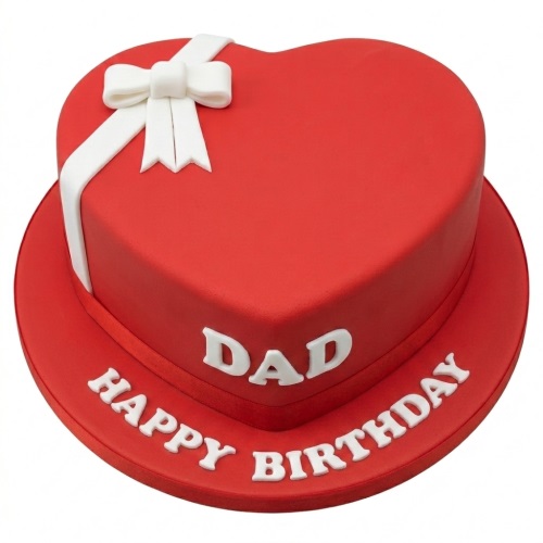 Red heart-shaped birthday cake with white fondant bow and 'Happy Birthday' message for Dad.