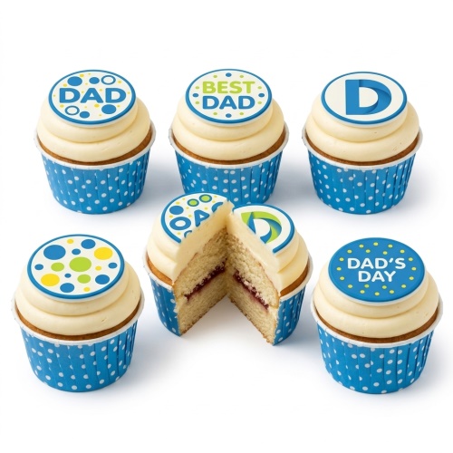White frosted cupcakes with blue polka dot cases and "DAD", "BEST DAD", "DAD'S DAY" toppers.
