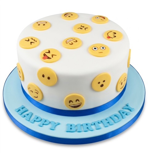 Round white birthday cake decorated with yellow emoji faces and a blue ribbon on a blue cake board.