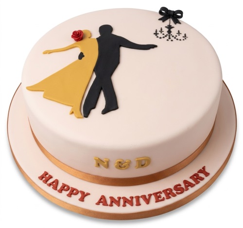 Round anniversary cake with dancing couple silhouette, red rose, chandelier, and custom initials.