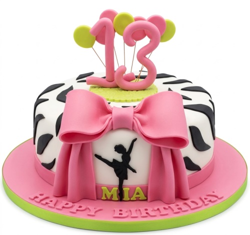 Round ballet themed birthday cake with a pink bow, black ballerina silhouette, zebra print, and custom age topper.