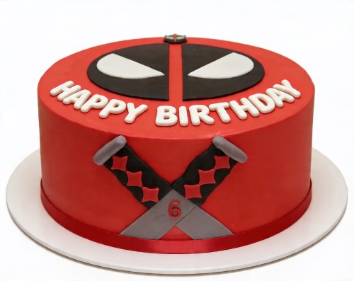 Round red Deadpool birthday cake with black and white mask, crossed katanas, and custom age '6' on the side.