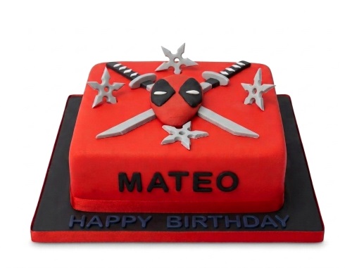 Red square Deadpool birthday cake with crossed swords, shurikens, and a custom name.
