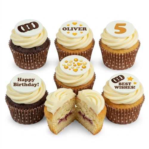 A selection of personalised birthday cupcakes with white frosting and custom edible toppers showing names, ages, and messages.