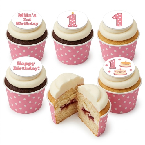 Six 1st birthday cupcakes with pink polka dot wrappers, white frosting, and number one toppers.