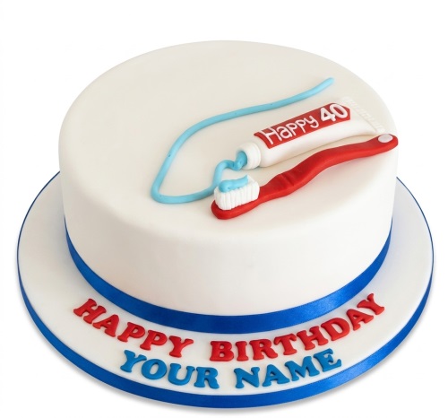 White round birthday cake with a red toothbrush and toothpaste decoration, blue ribbon, and custom message.
