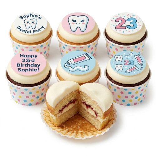 Cupcakes with white frosting and edible toppers featuring cute tooth, toothpaste, and custom age designs.