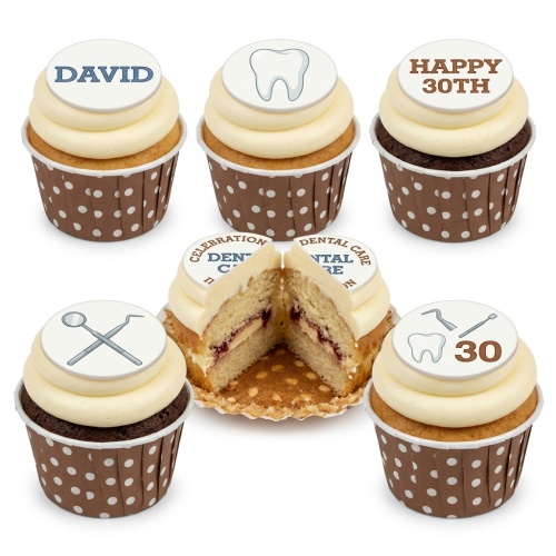 Dental theme birthday cupcakes with tooth and dental tool toppers.