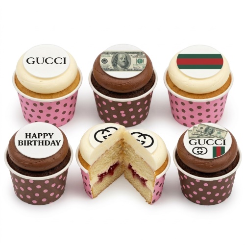 Collection of Gucci inspired birthday cupcakes with designer logos and dollar bill toppers, some with vanilla and chocolate frosting.