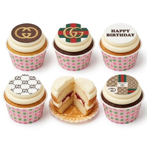 Set of six designer cupcakes with Gucci logo toppers and 'Happy Birthday' message.