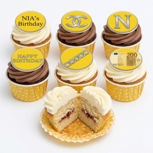 Assorted designer-themed birthday cupcakes with custom initial, chain, and money toppers.