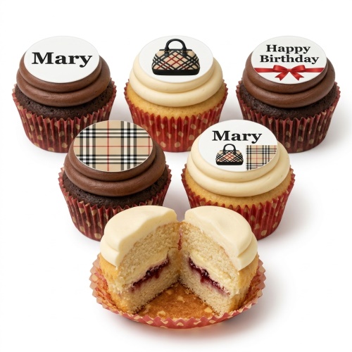 A selection of designer-themed birthday cupcakes with plaid patterns, handbag toppers, and a custom name topper.