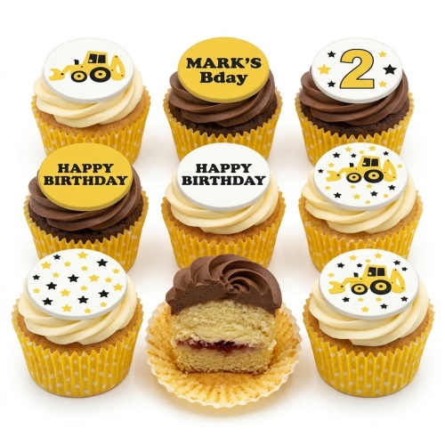 Assortment of digger themed birthday cupcakes with yellow and white frosting, star decorations, and custom age/message toppers.