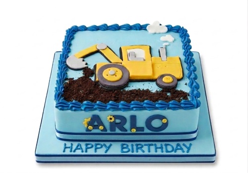 Square blue birthday cake with a yellow digger and brown dirt, blue piped icing, and a personalised name.