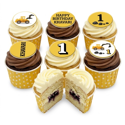 Assortment of digger themed birthday cupcakes with yellow and chocolate frosting, featuring digger and custom age '1' toppers.