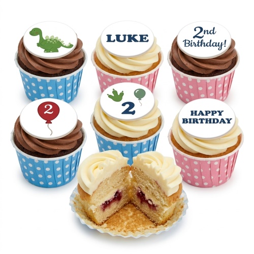 Set of dinosaur themed birthday cupcakes with custom age and name toppers, in blue and pink wrappers.