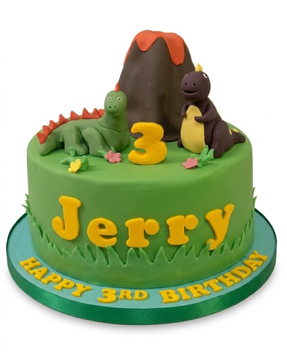 Green round birthday cake with 3D dinosaur and volcano toppers, featuring a custom age number.