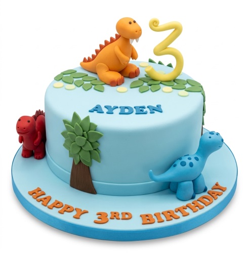 Blue dinosaur birthday cake with three dinosaur figures, green leaves, and a custom age topper.