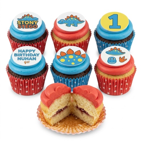 Dinosaur themed cupcakes with blue and red frosting, featuring various dinosaur toppers and a custom age number.