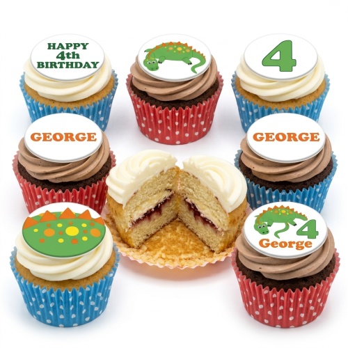 Assortment of vanilla and chocolate cupcakes with white and brown icing, topped with green dinosaur designs, a custom age number, and a personalised name.