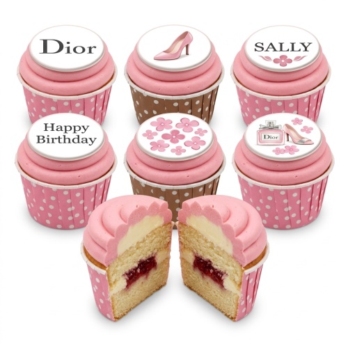Pink Dior themed birthday cupcakes with high heels, perfume bottle, and floral decorations.