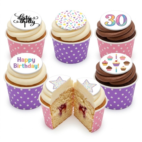 Six birthday cupcakes with white and chocolate frosting, featuring custom age and sprinkle toppers in pink and purple cases.