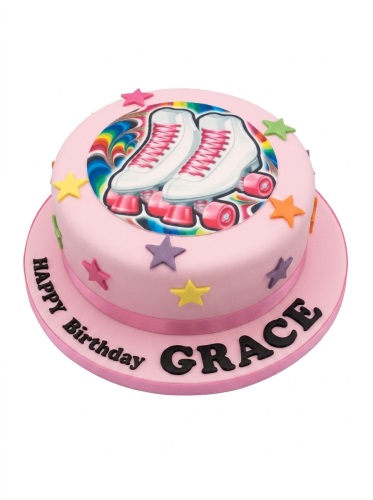 Round pink birthday cake with roller skate edible image and colourful star decorations.