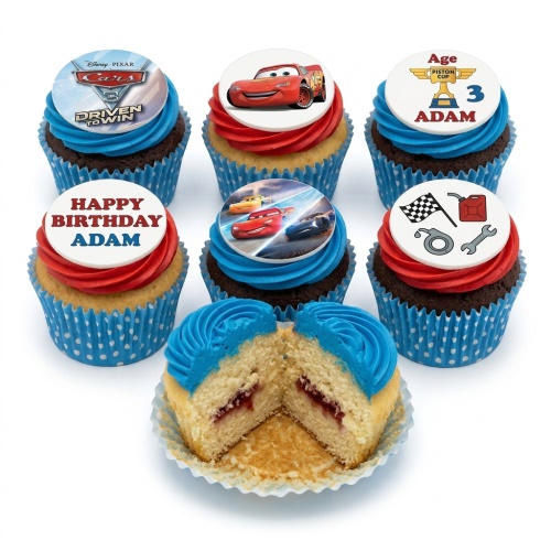 Disney Cars themed cupcakes with red and blue frosting, featuring Lightning McQueen and racing icons, with a custom age topper.