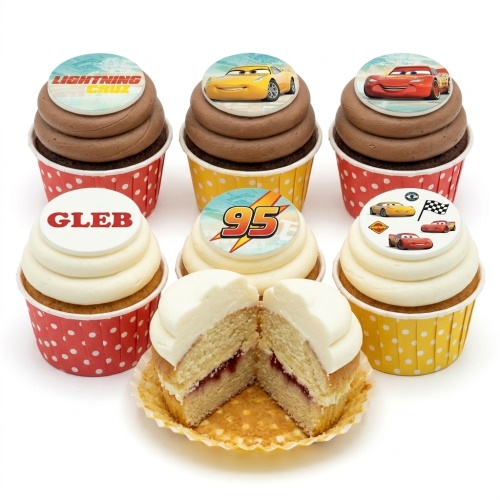 Assortment of Disney Cars themed cupcakes with Lightning McQueen and Cruz Ramirez toppers, some with a custom name.
